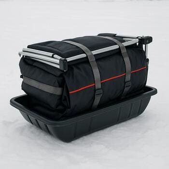 Solo ice shack layout after fishing with gear stacked by the door